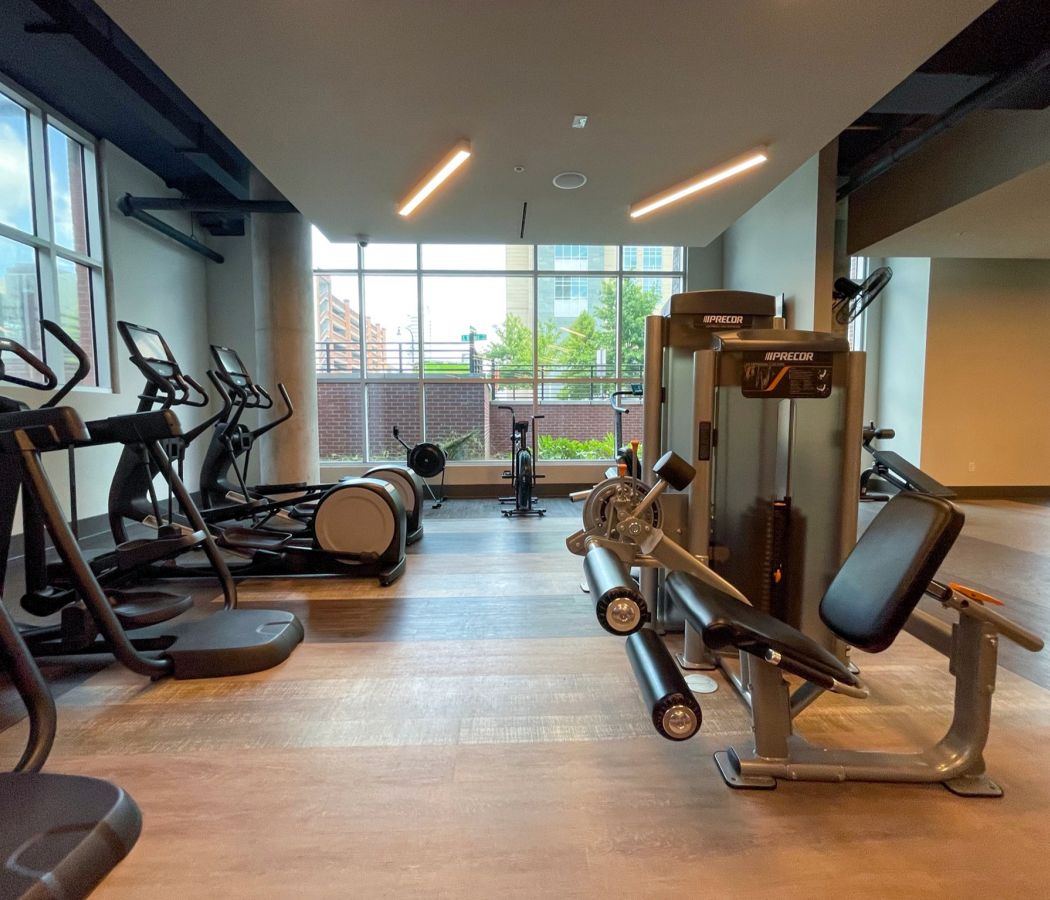 Van Alen apartments resident amenity fitness center with cardio and weight machines