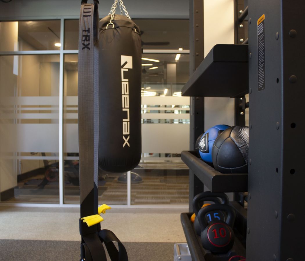 Van Alen community amenity fitness center with TRX equipment