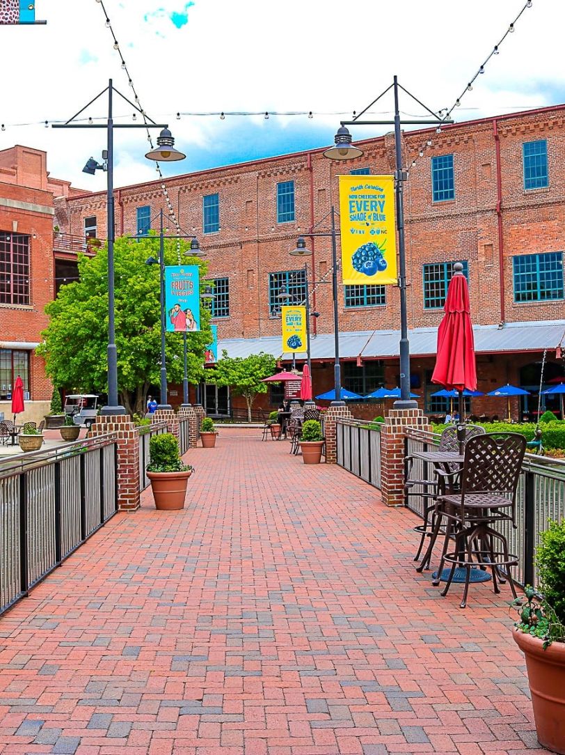 American Tobacco Historic Campus exterior view of brick buildings with shops and cafes, Durham NC