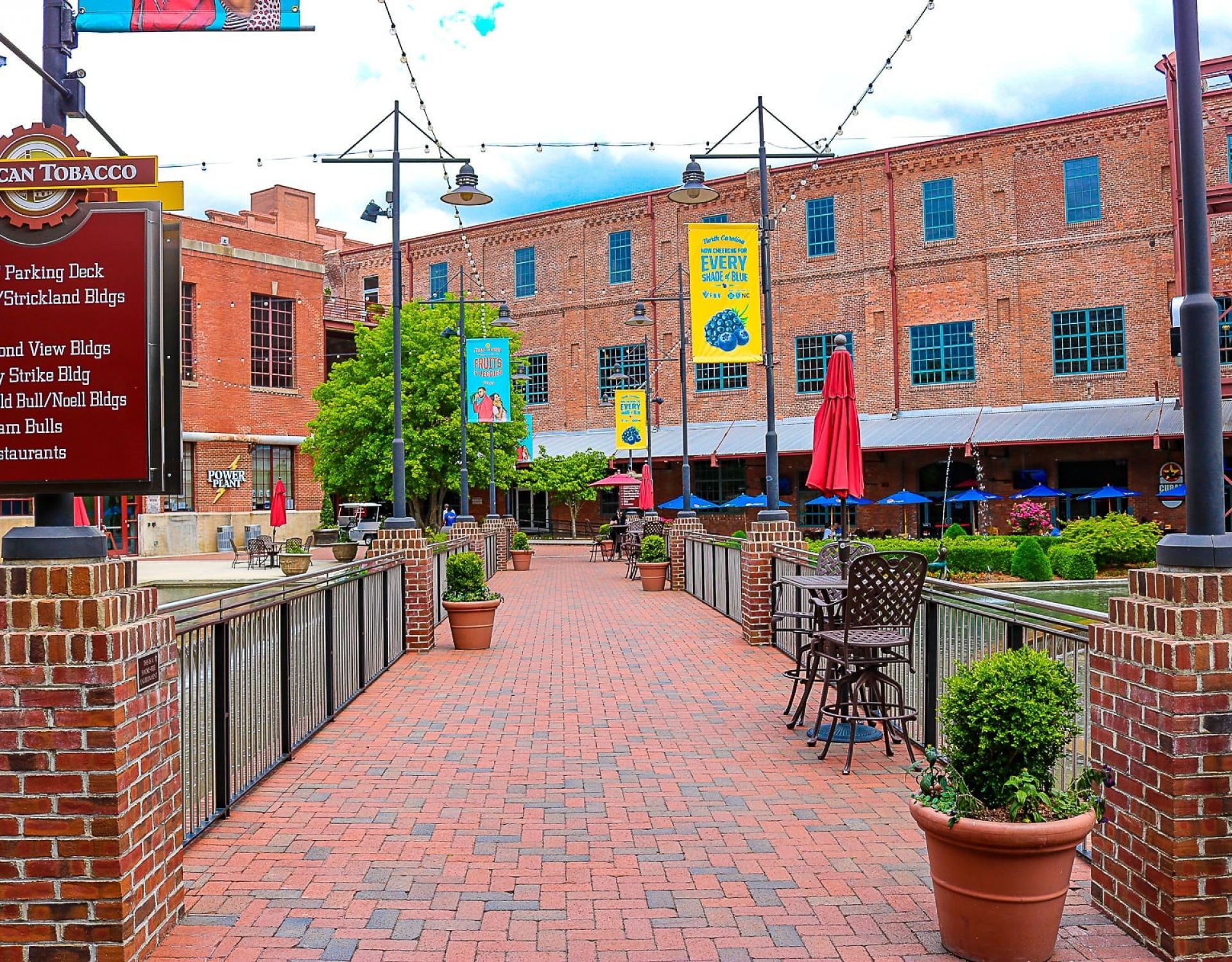 American Tobacco Historic Campus exterior view of brick buildings with shops and cafes, Durham NC
