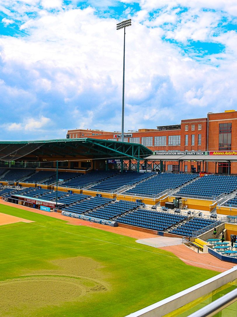 Durham Bulls Athletic Park baseball field with covered stadium seating