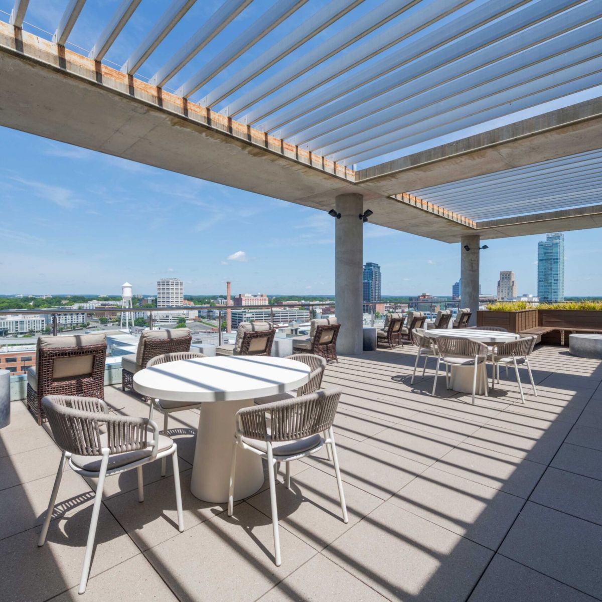 Van Alen apartments resident community lounge with billiards tables and courtyard views