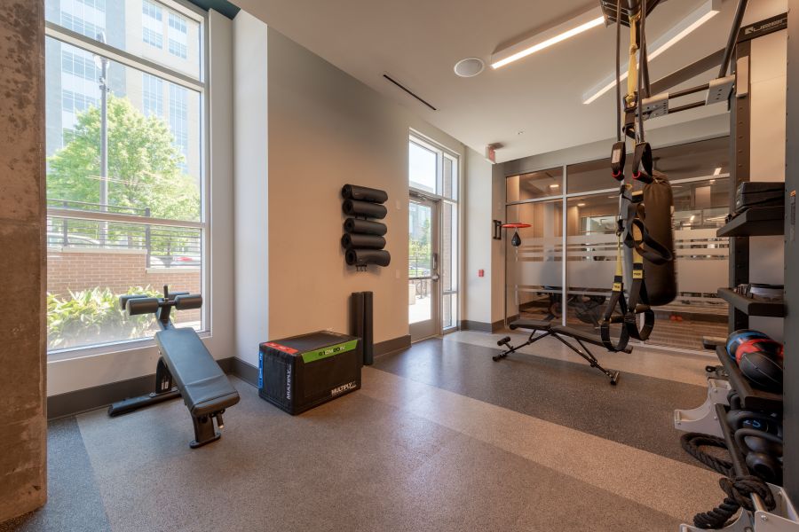 Van Alen apartments resident amenity fitness center with cardio and weight machines