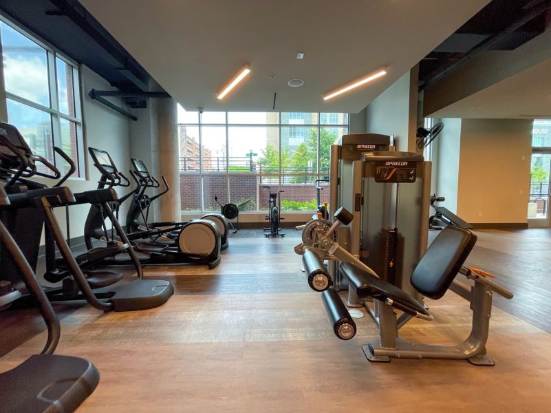 Van Alen apartments resident amenity fitness center with cardio and weight machines