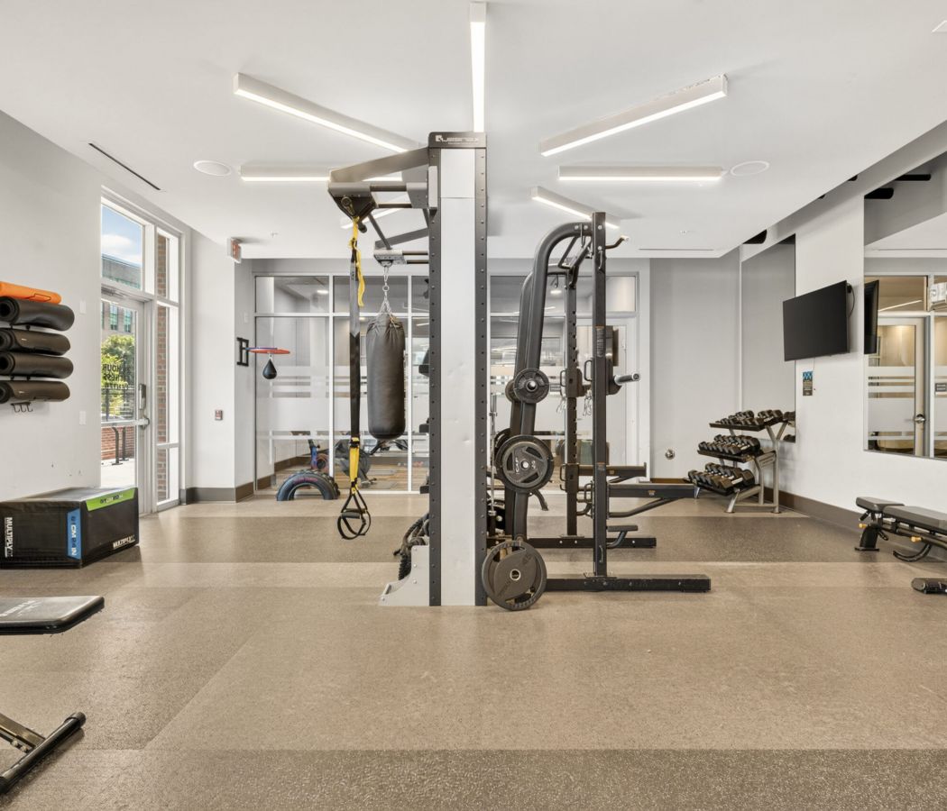 Van Alen apartments resident amenity fitness center with cardio and weight machines
