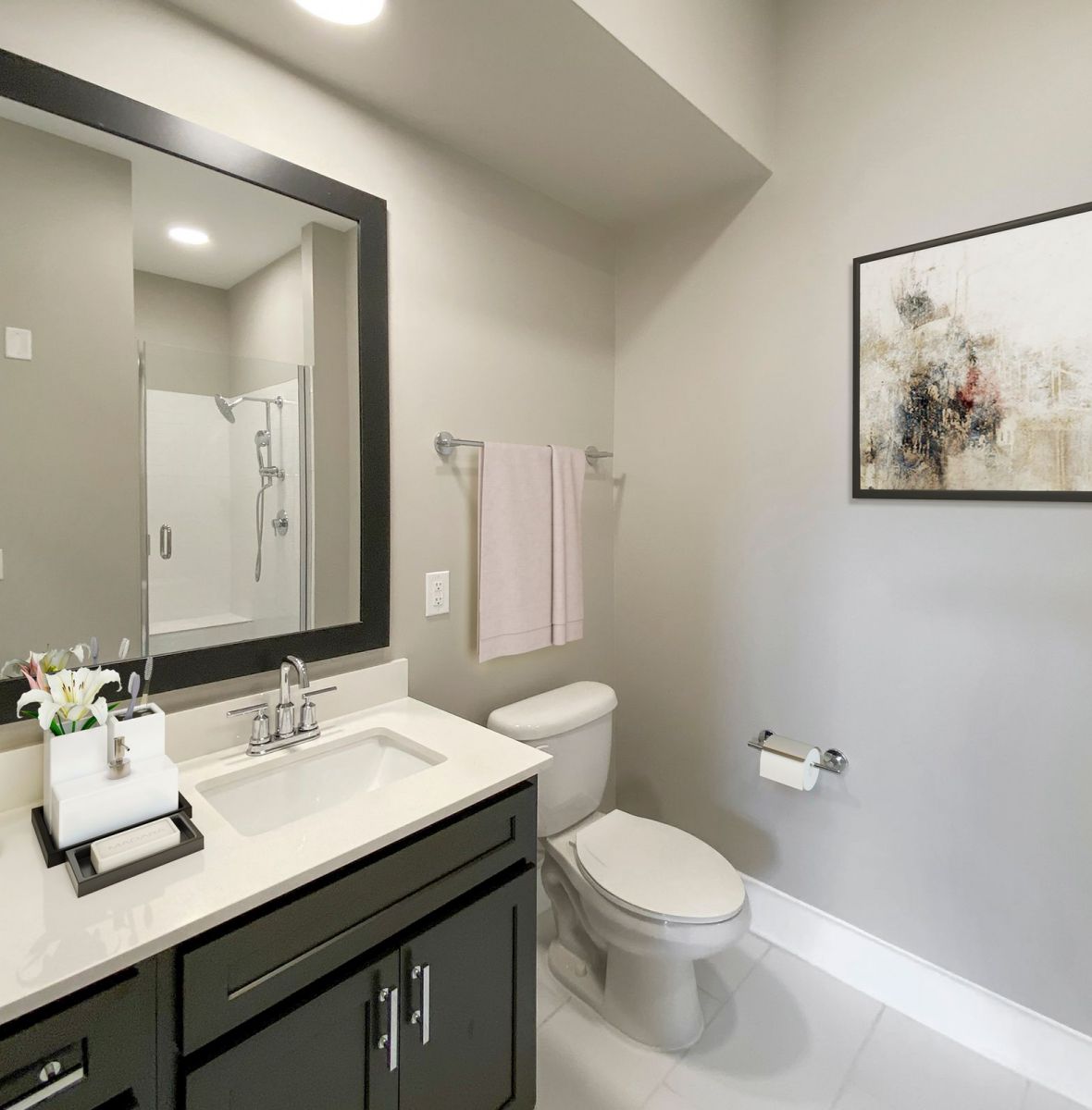 Providence Row apartment kitchen with island, stainless steel appliances, and beautiful finishes
